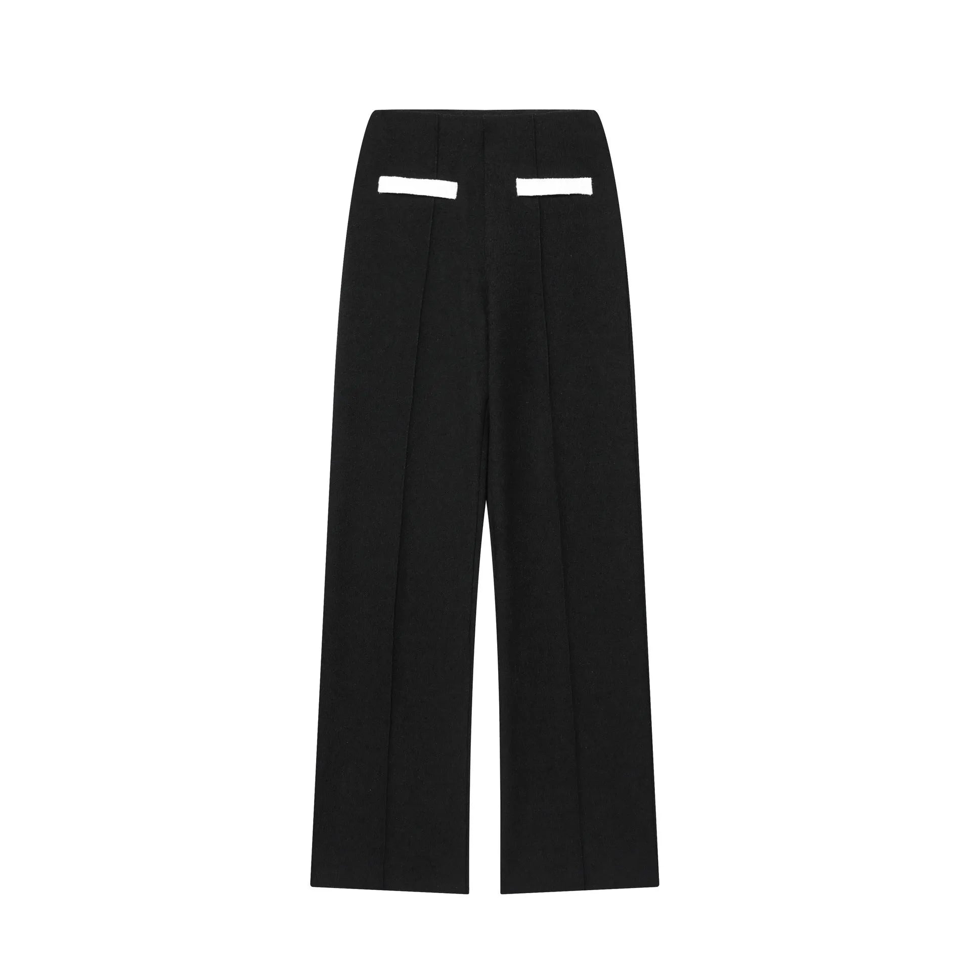 Women's casual suit set with a beaded leather top and high-waisted trousers on a model.