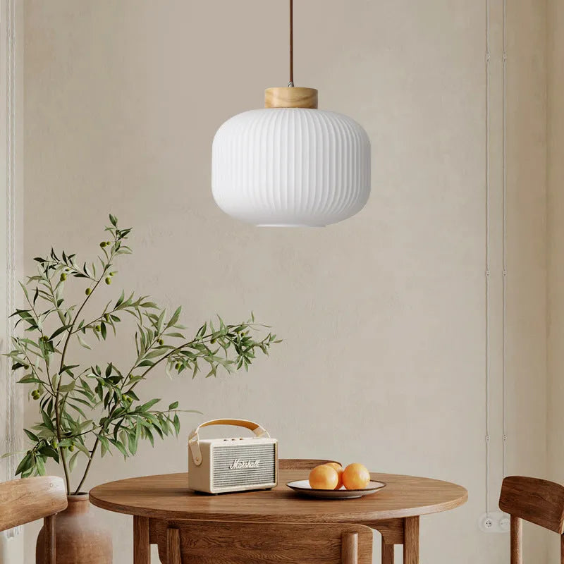 Retro Nordic style wooden pendant light with three size options and neutral, warm, or white light colours
