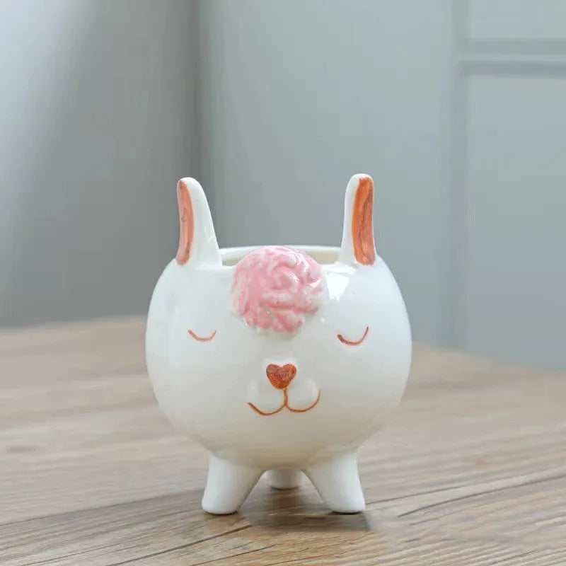 Ceramic succulent flowerpot with hand-painted cartoon animal design in pastel colours
