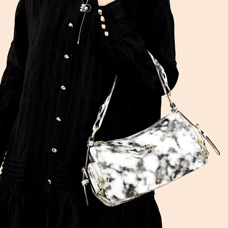PU leather Boston pillow bag in khaki with stitched seams and stone pattern, double shoulder straps, internal pocket