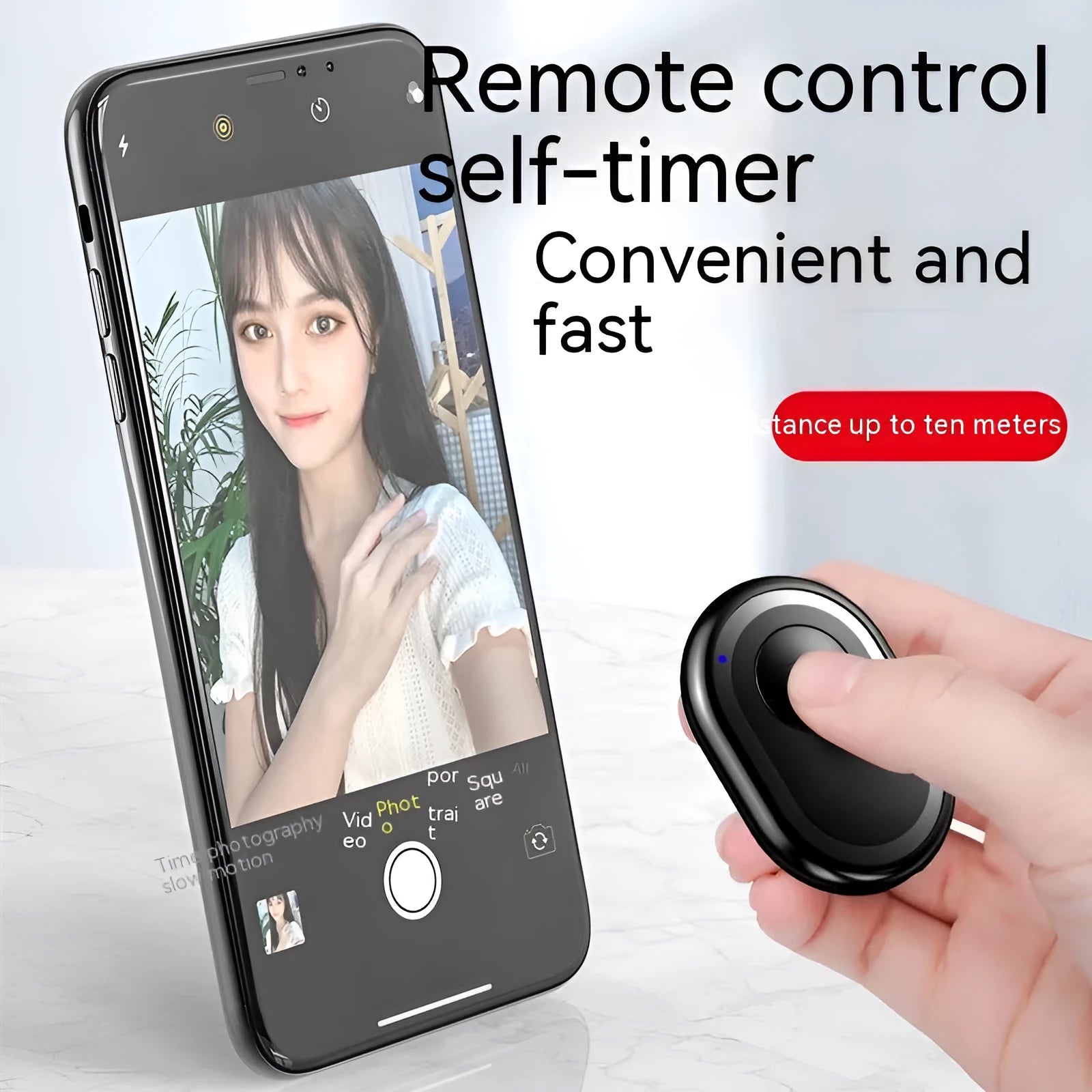 Wireless Bluetooth self-timer remote control in black, pink, and purple colours next to a smartphone.