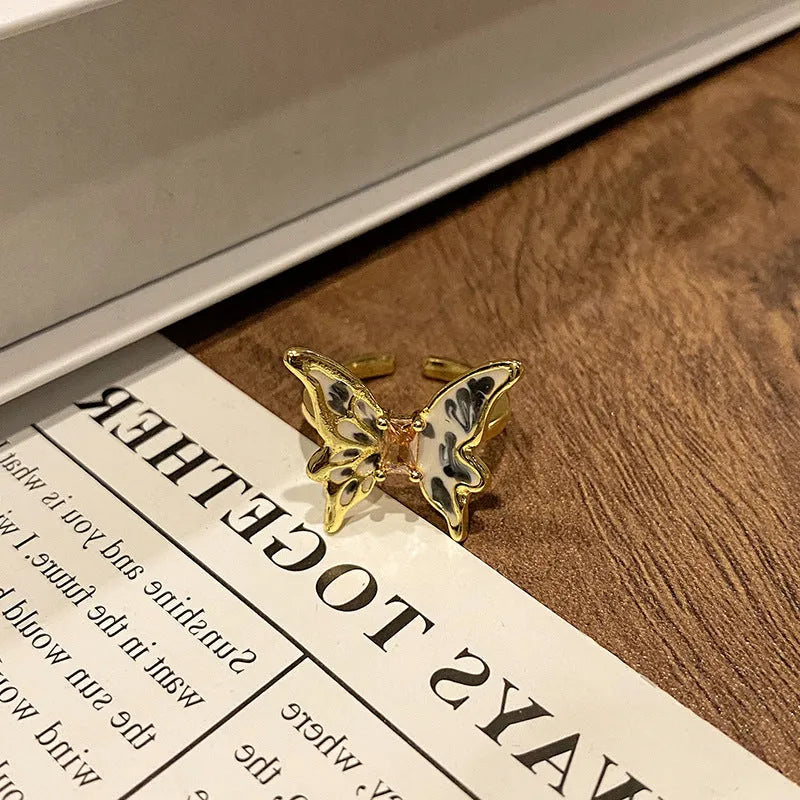 Copper women's ring with Chinese butterfly design and oil-drip finish in simple jewellery style