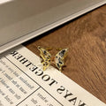 Copper women's ring with Chinese butterfly design and oil-drip finish in simple jewellery style