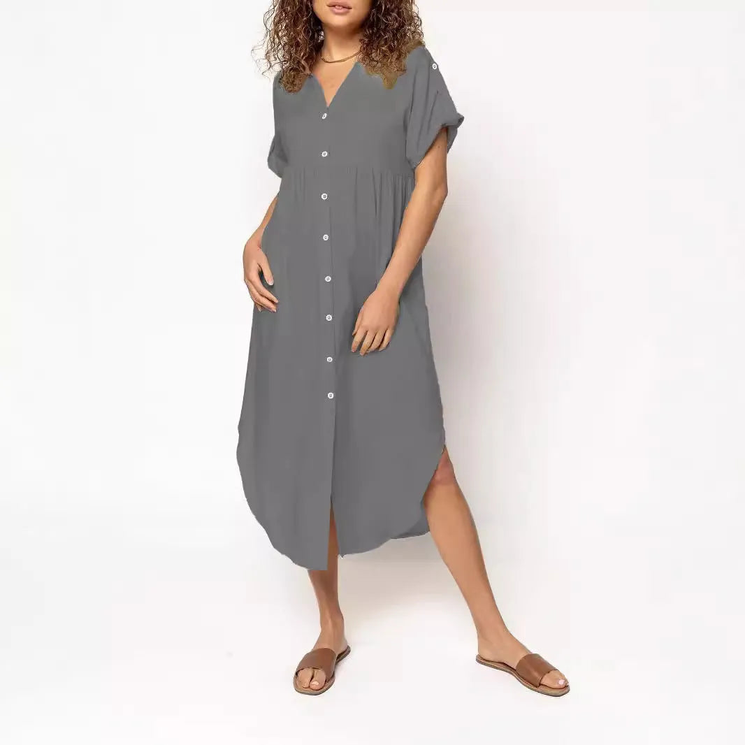 Loose fit casual midi dress with button front in solid colour on a model