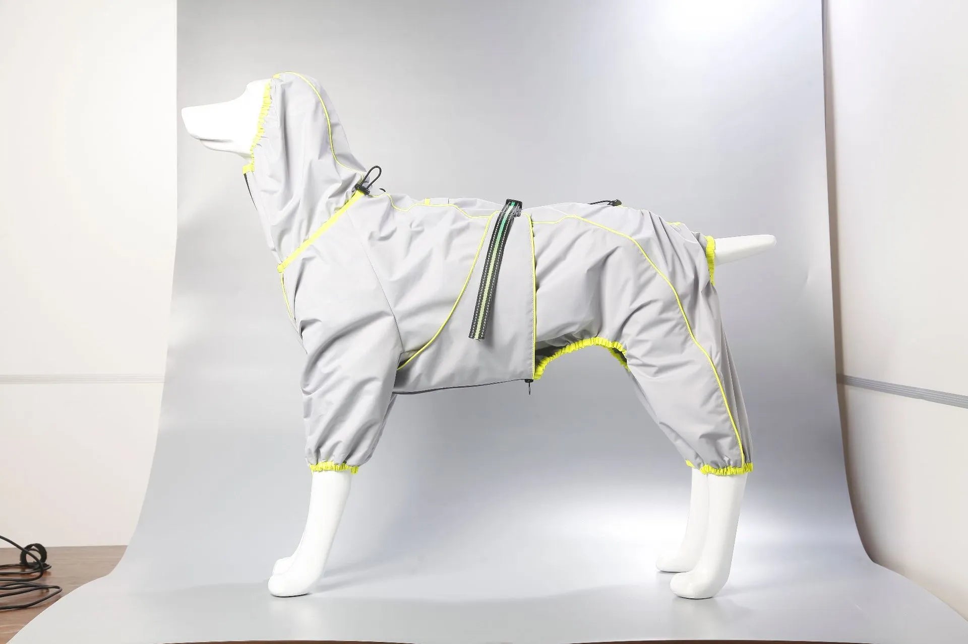 Red polyester padded dog jacket with zip front on a medium-sized dog.