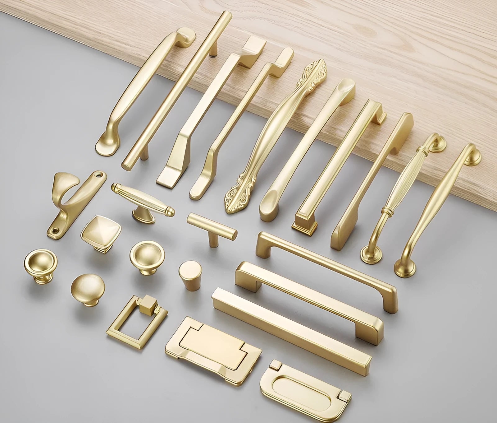 Modern gold T-shaped aluminium alloy cabinet handle showing hole spacing options.