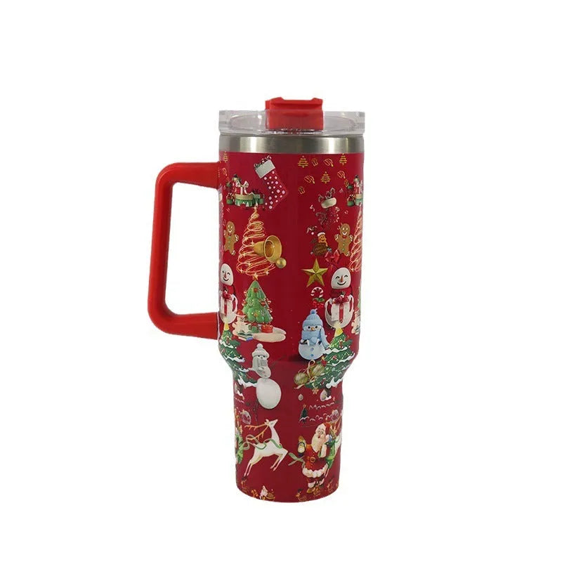 Red and green Christmas pattern stainless steel travel tumbler with handle and straw.
