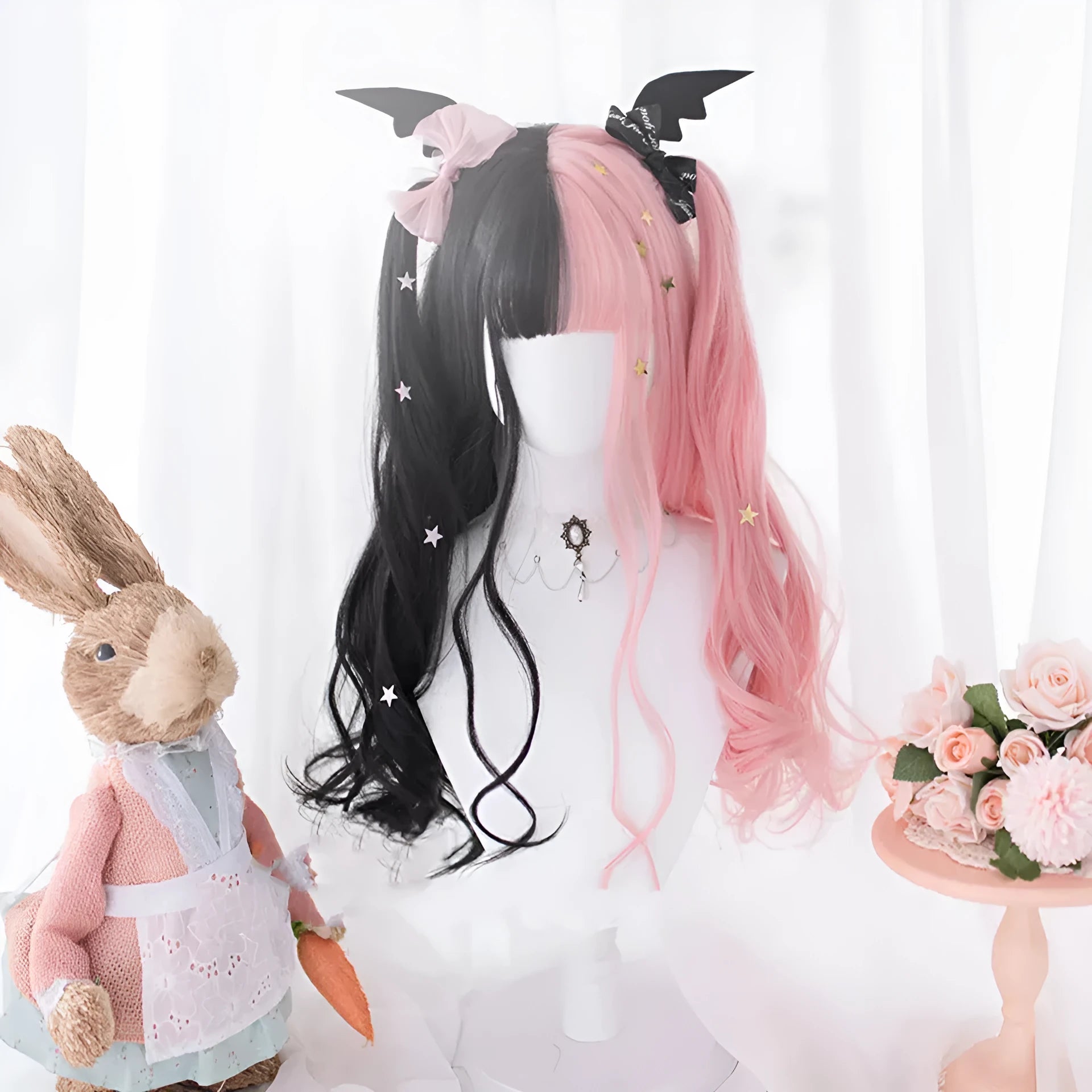 Harajuku Japanese Lolita long curly black and pink wig with full fringe, shown on a model.