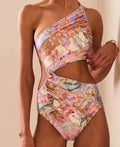 Women's rose gold patterned one-piece swimsuit on hanger