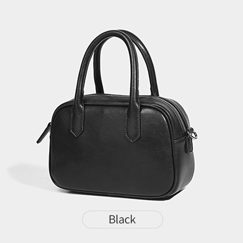 Retro small square PU leather messenger bag in black and coffee brown colours with a single adjustable strap.