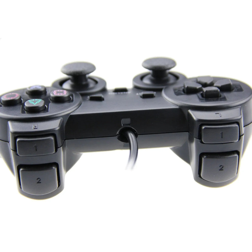 Wired PS2 game controller with USB cable, vibration function, and ABS plastic construction