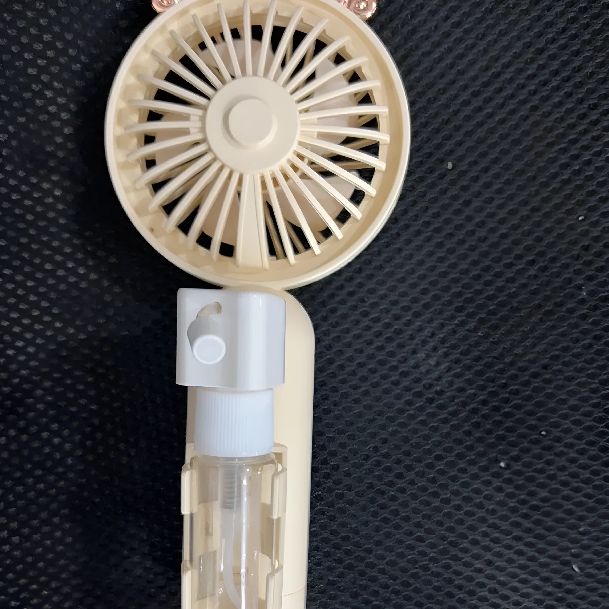 Personalised plastic nozzle fan in apricot colour with USB charging port