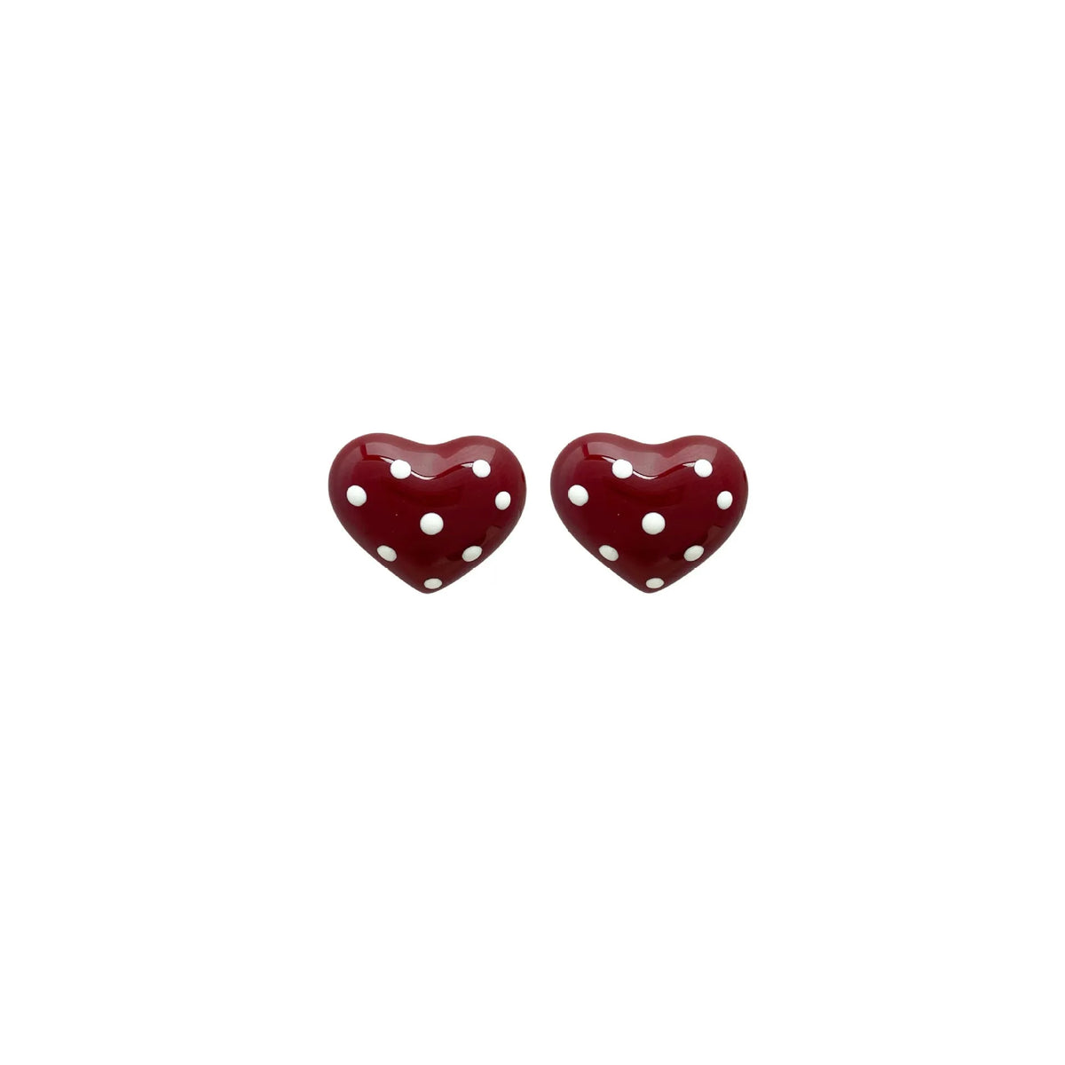 Red drip glaze heart earrings in copper, shown as no-piercing ear clips and stud earrings