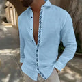 Cotton and linen printed men's shirt with lapel button, long sleeves, and collage stitching in emerald green