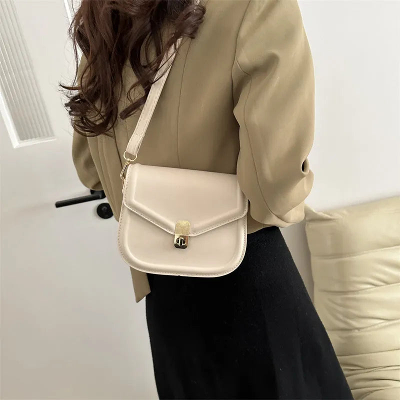 Soft PU leather clamshell messenger bag in horizontal square shape, shown in khaki colour.