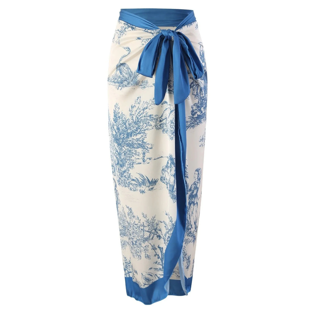 Women's blue patterned one-piece swimsuit with matching gauze skirt swimwear set