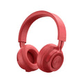 Red sports wireless Bluetooth headset on a black background, showing earpiece and charging port.