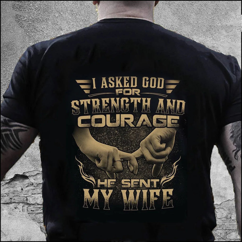 Mens black loose-fit polyester T-shirt with skull and slogan print on front, shown on model