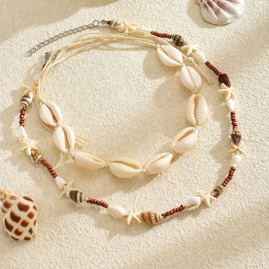 Geometric shell pendant necklace on regular chain in colour X1900
