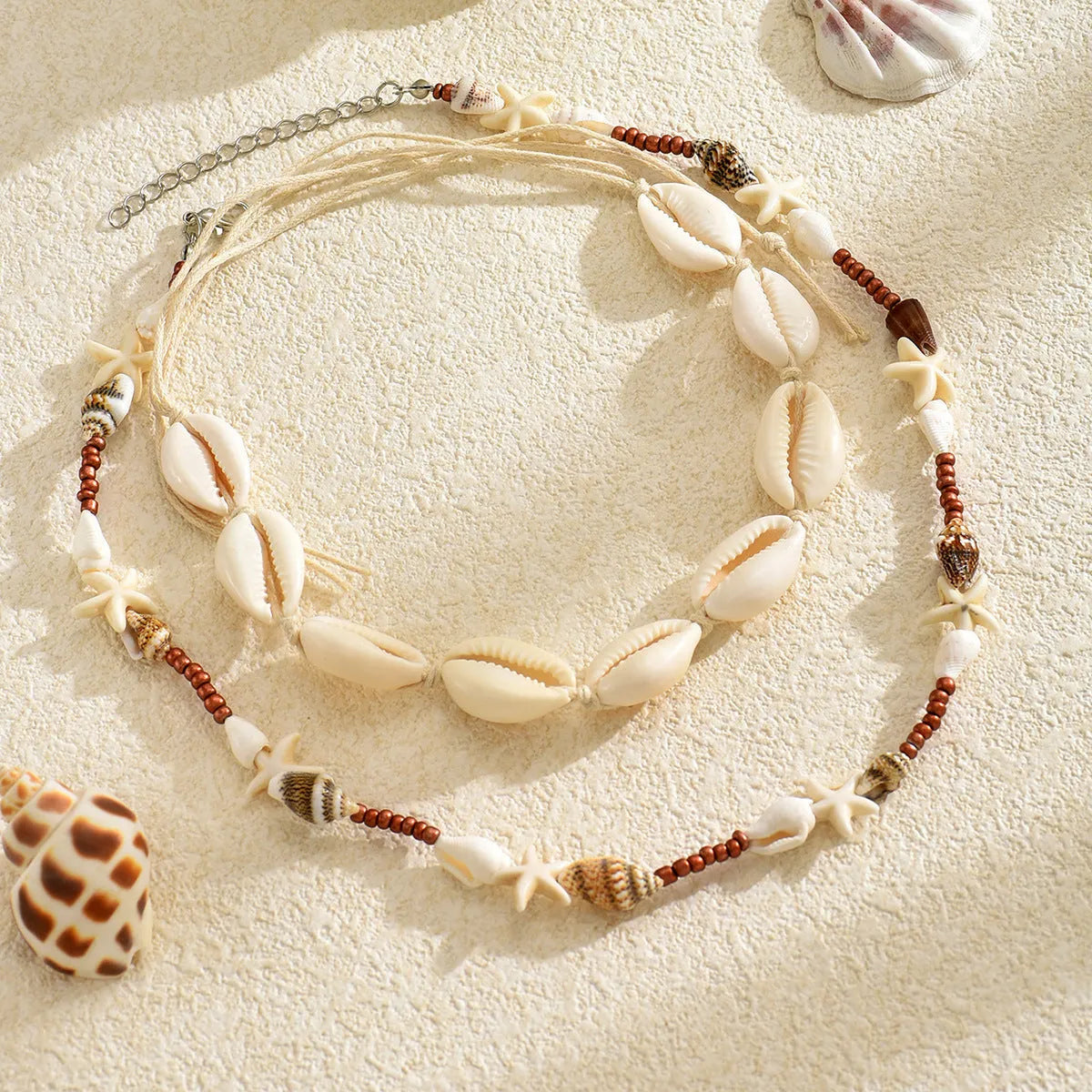 Geometric shell pendant necklace on regular chain in colour X1900