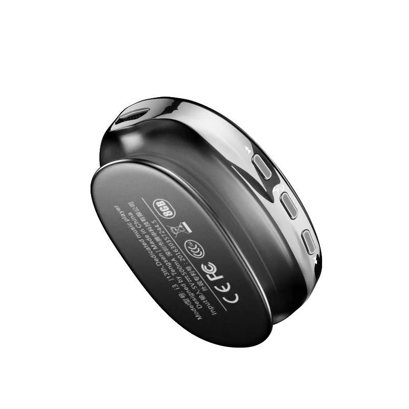 A compact blue Bluetooth MP4 music player with an OLED screen displaying a track list.