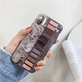 Flesh coloured silicone iPhone case with an eye shadow pattern design on the back.