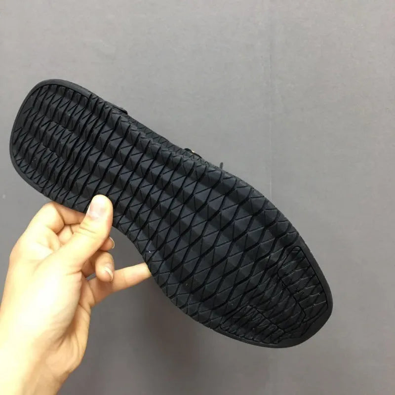 Pair of white stripe-pattern running shoes with mesh upper and MD outsole