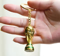 World Cup synthetic resin keychain on a plain background showing compact 7cm design with football theme