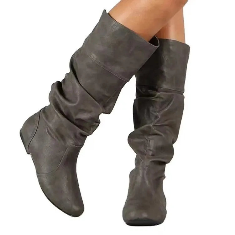 Women's black flat slip-on ankle boots with round toe and high cylinder shaft