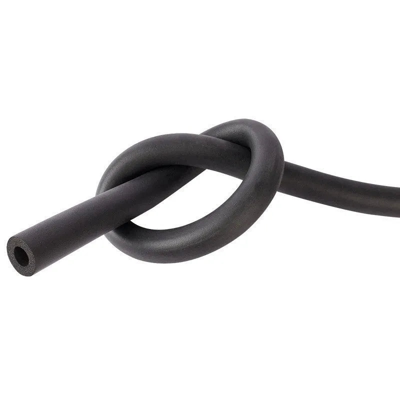 Self-adhesive rubber and plastic foam pipe insulation tube on a coil of pipe.