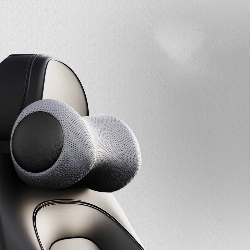 Memory cotton car massage cushion on a car seat in classic black colour.