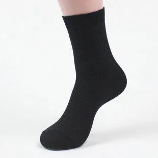 Men's bamboo fibre socks in black, navy, silver, iron grey, and grey blue with small square pattern.
