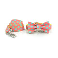 Yellow polka dot dog collar and lead set with bow accents and five size options