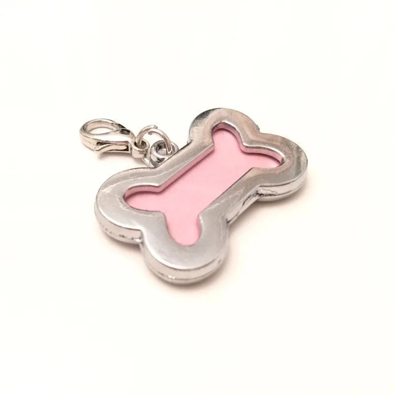 Metal diamond dog pendant necklace with pink bone pattern on a pet collar
