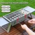 Flat-folded portable charcoal barbecue grill next to its unfolded cooking position