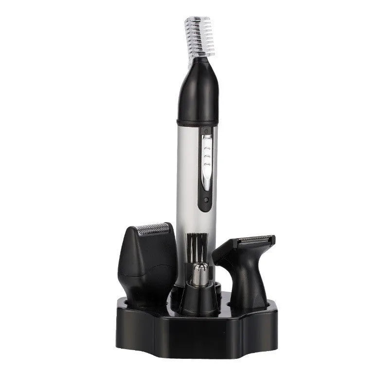 White male electric nose hair trimmer with charging base and four heads on a table