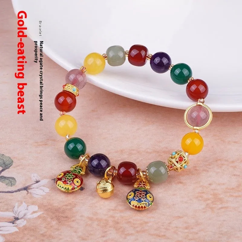 Hand-woven agate bracelet with Swallowing Gold Beast design on 10mm beads