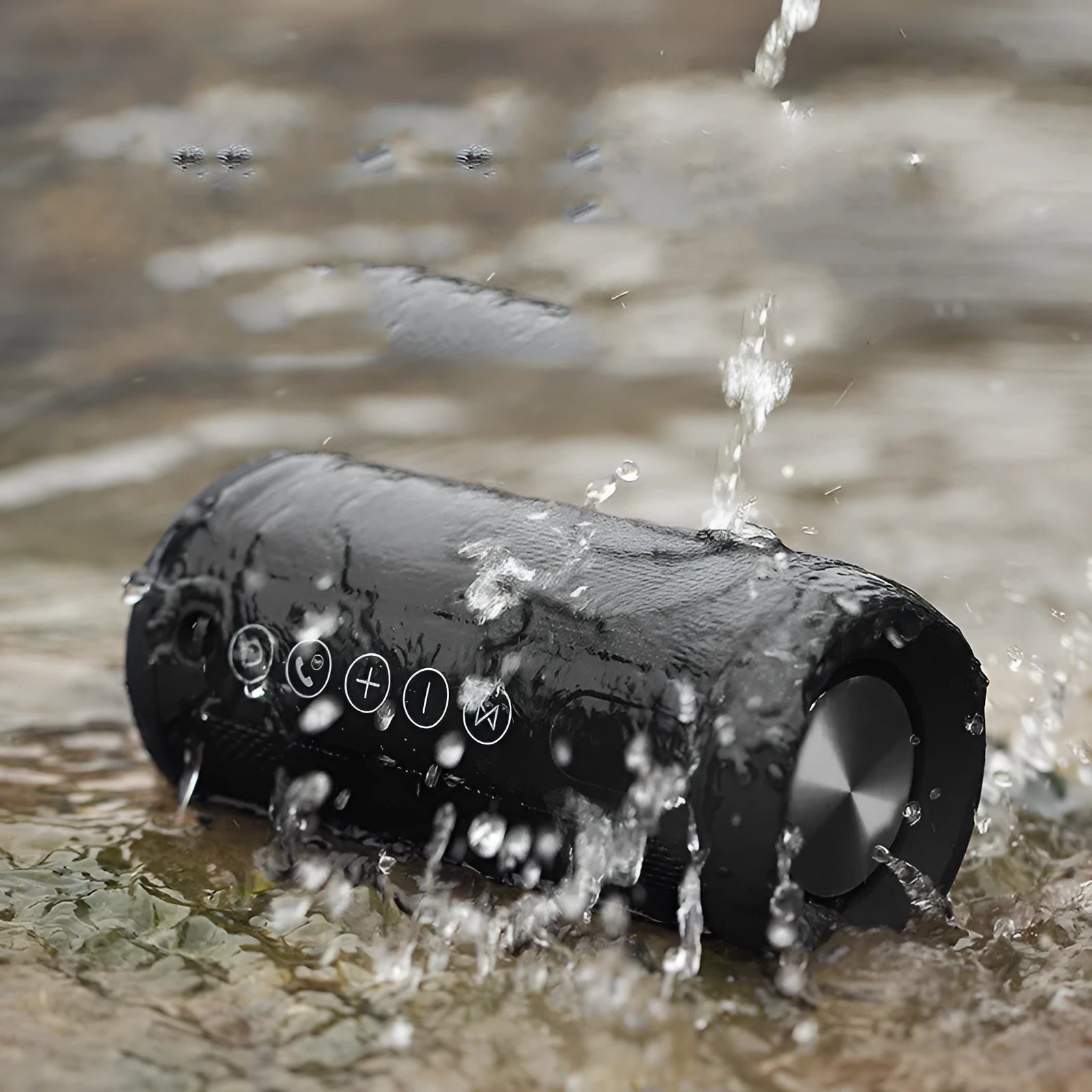 Compact waterproof Bluetooth speaker in camouflage colour, showing control buttons and sealed ports.