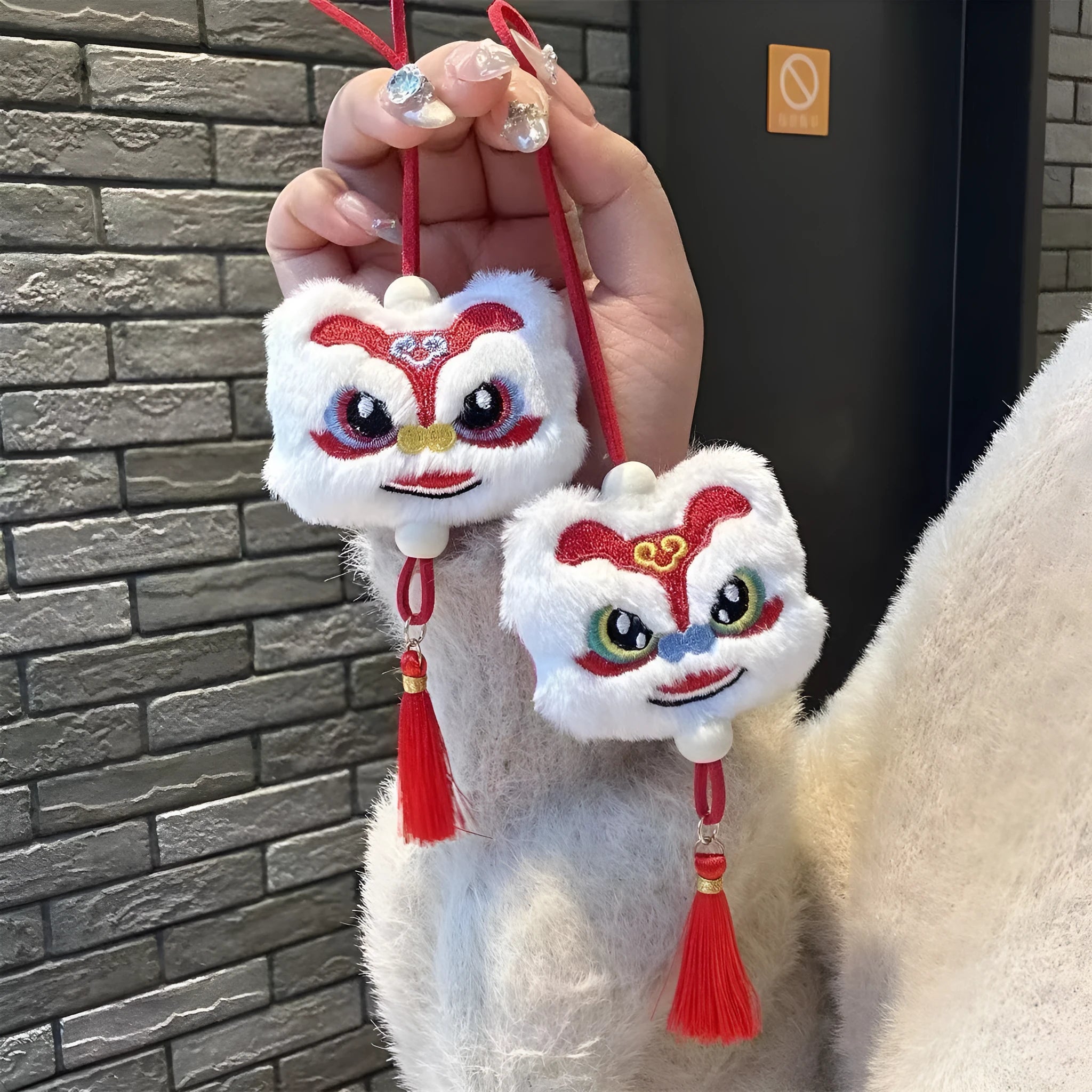 Chinese style blue plush lion keychain ornament with tassel and star stone decorative detail