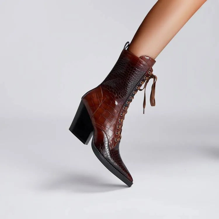 Women's dark brown retro pointed toe ankle boots with a chunky heel and side zip.