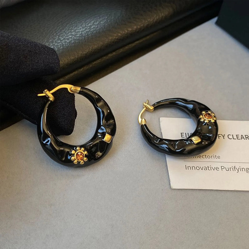 Hong Kong style retro ear studs with dripping oil texture and rhinestone decoration in black or red colour options