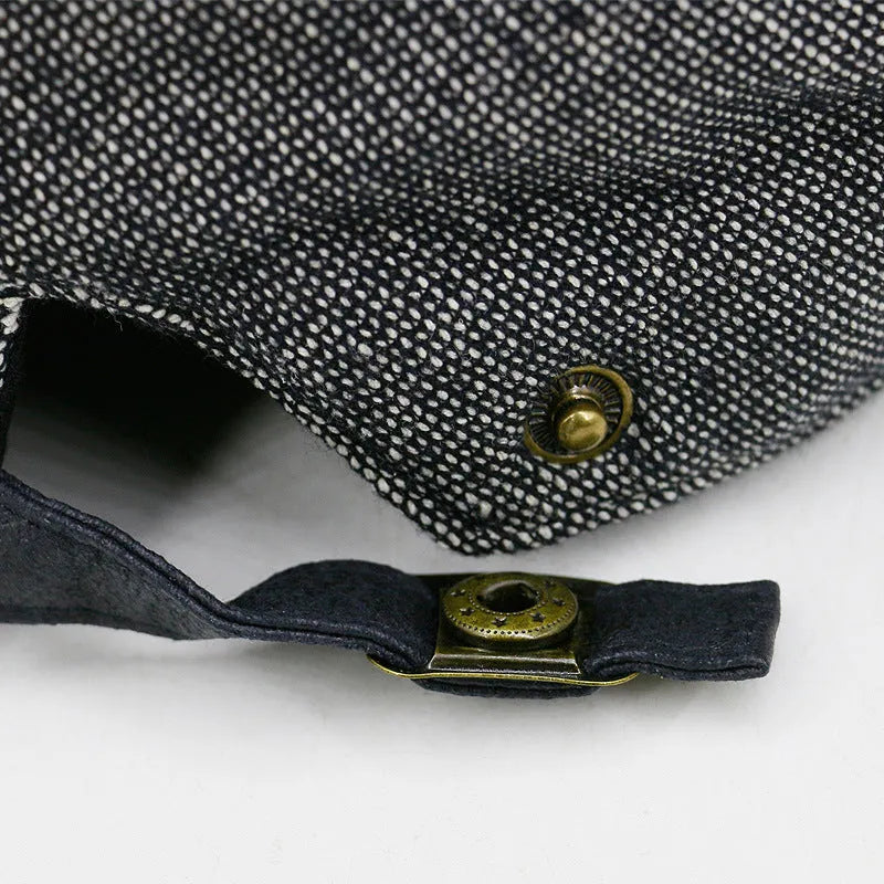 Men's cotton linen blend beret hat in black on a model, showing dome crown style.