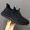 Pair of white stripe-pattern running shoes with mesh upper and MD outsole