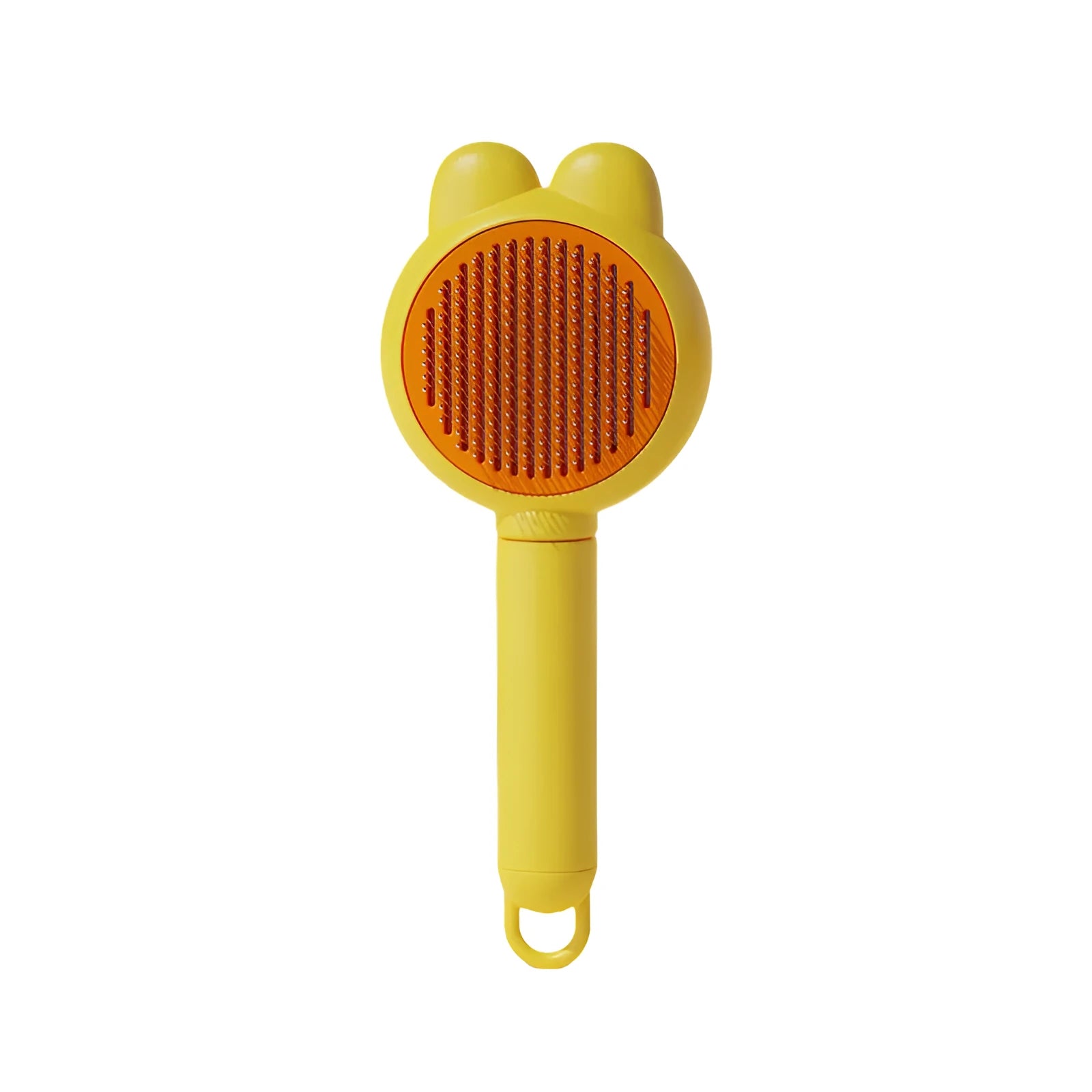 Self-cleaning cat brush with release button showing stainless steel teeth with rubber tips