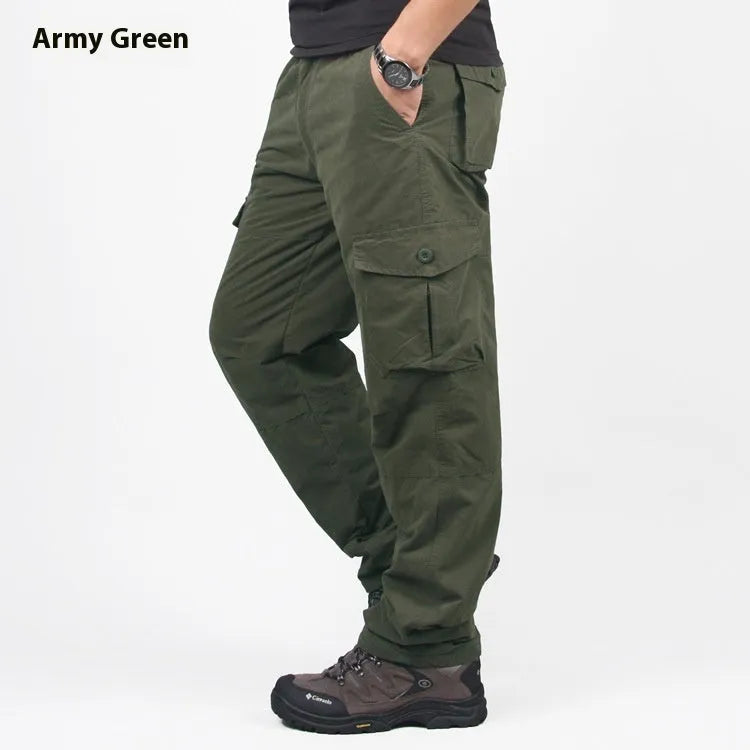 Men's wool-lined cotton velvet overalls in army green, shown in a loose straight-leg fit.