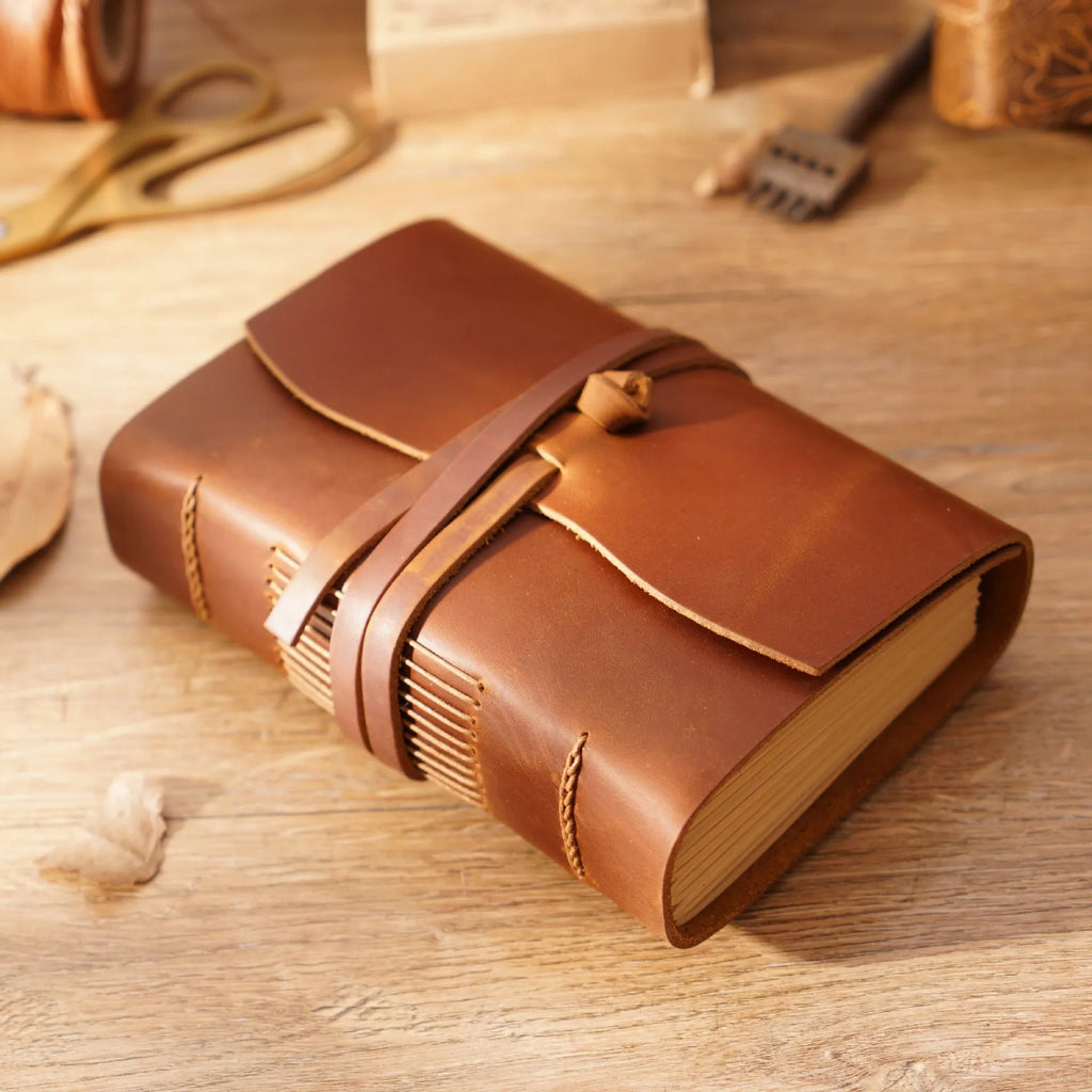 Real leather notebook in brown with 400 blank 120gsm kraft pages, 100 x 155mm, handmade binding
