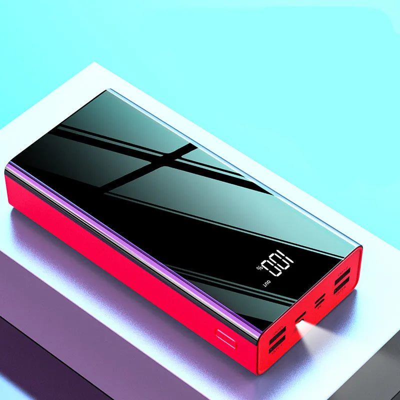 Black or red 40000 mAh power bank with digital LCD screen showing battery percentage.