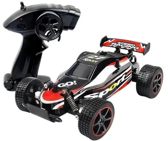 Blue 1:18 scale remote control off-road drift car with 2.4GHz remote on a grey surface.