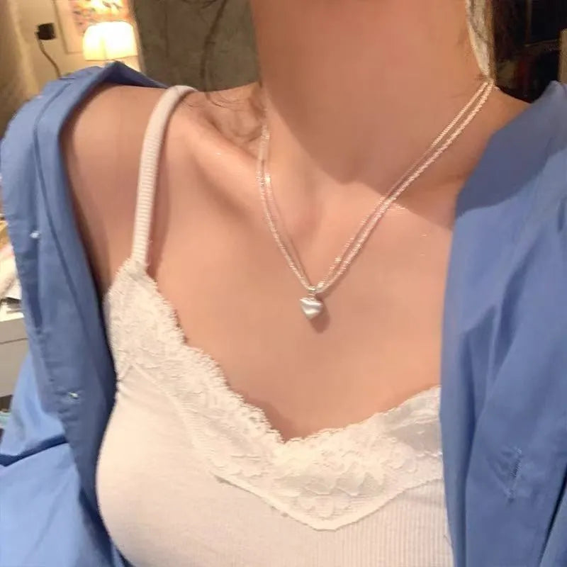 Women's double-layer brushed heart pendant necklace with adjustable silver chain