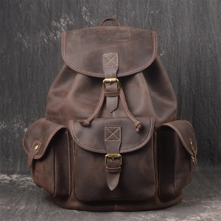 Men's leather drawstring backpack in first layer cowhide, retro style, 30cm x 15cm x 40cm, with curved shoulder strap and soft handle.